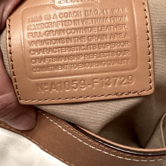 COACH PURSE. Bone colored with tan trim. Pleated. Back slip pocket. Clean inside - Picture 4 of 10